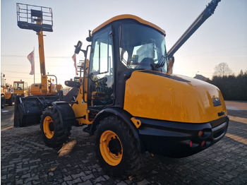 Ελαστιχοφόρος φορτωτής JCB 406 B: φωτογραφία 2