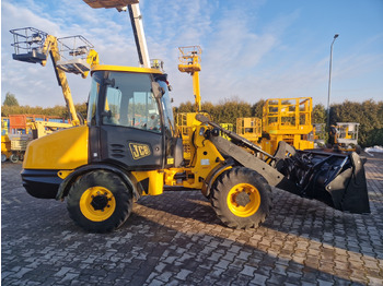 Ελαστιχοφόρος φορτωτής JCB 406 B: φωτογραφία 4