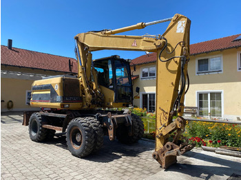 Τροχοφόρος εκσκαφέας CATERPILLAR M312