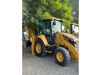 Φορτωτής εκσκαφέας CATERPILLAR