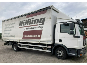 Επαγγελματικό αυτοκίνητο με μουσαμά MAN