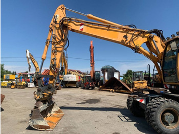 Τροχοφόρος εκσκαφέας Hyundai Robex 180 W-9 A: φωτογραφία 4 Τροχοφόρος εκσκαφέας Hyundai Robex 180 W-9 A: φωτογραφία 4