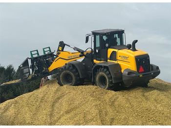 Ελαστιχοφόρος φορτωτής NEW HOLLAND