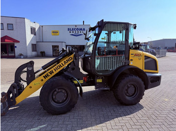 Ελαστιχοφόρος φορτωτής NEW HOLLAND