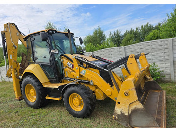 Φορτωτής εκσκαφέας CATERPILLAR