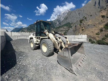 Ελαστιχοφόρος φορτωτής CATERPILLAR