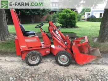 Ελαστιχοφόρος φορτωτής Weidemann 910 D/R: φωτογραφία 1