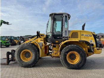 Ελαστιχοφόρος φορτωτής NEW HOLLAND