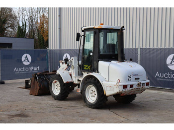 Ελαστιχοφόρος φορτωτής JCB Santerne ZX: φωτογραφία 4