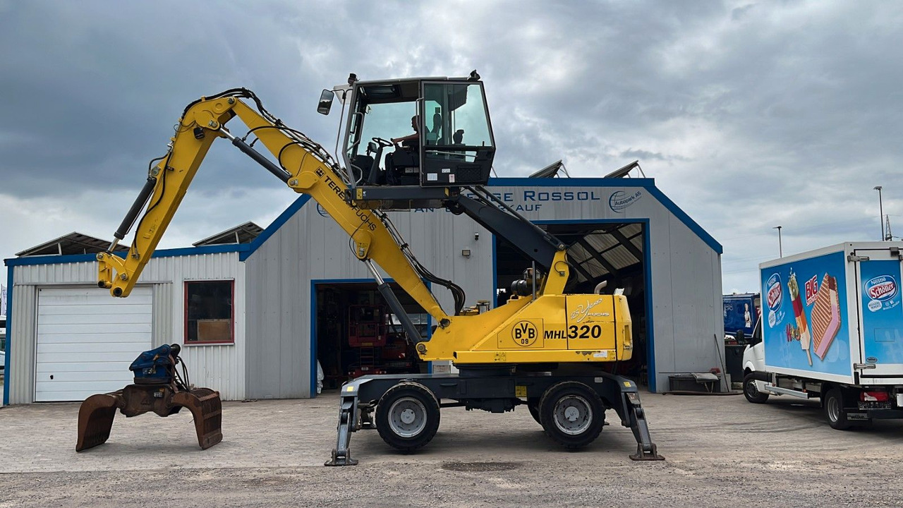 Fuchs TeRex MHL 320 D Umschlagbagger Greifer Pratzen - Μηχάνημα Διαχείρισης Υλικών: φωτογραφία 2 Fuchs TeRex MHL 320 D Umschlagbagger Greifer Pratzen - Μηχάνημα Διαχείρισης Υλικών: φωτογραφία 2