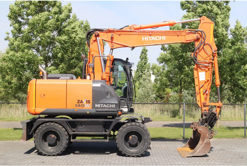 Hitachi ZX 140 W-5B | TILT QC | BUCKET | DOZER BLADE | DUTCH REG. - Τροχοφόρος εκσκαφέας: φωτογραφία 4 Hitachi ZX 140 W-5B | TILT QC | BUCKET | DOZER BLADE | DUTCH REG. - Τροχοφόρος εκσκαφέας: φωτογραφία 4