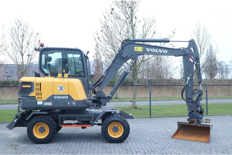 Volvo EW 60 E | DEMO | 30 KM/H | ROTOTILT + GRIPPER | BUCKET - Τροχοφόρος εκσκαφέας: φωτογραφία 4 Volvo EW 60 E | DEMO | 30 KM/H | ROTOTILT + GRIPPER | BUCKET - Τροχοφόρος εκσκαφέας: φωτογραφία 4