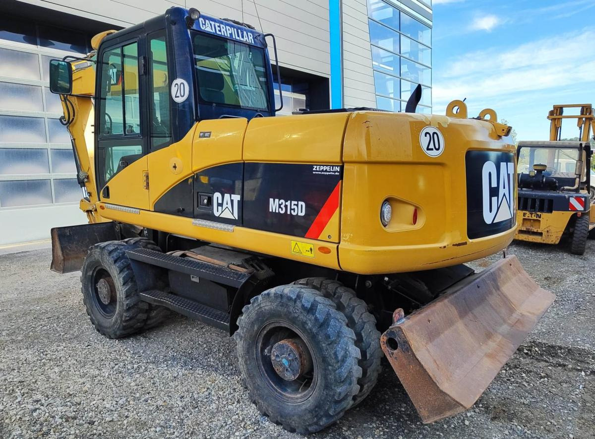 Caterpillar M315D - Τροχοφόρος εκσκαφέας: φωτογραφία 1 Caterpillar M315D - Τροχοφόρος εκσκαφέας: φωτογραφία 1