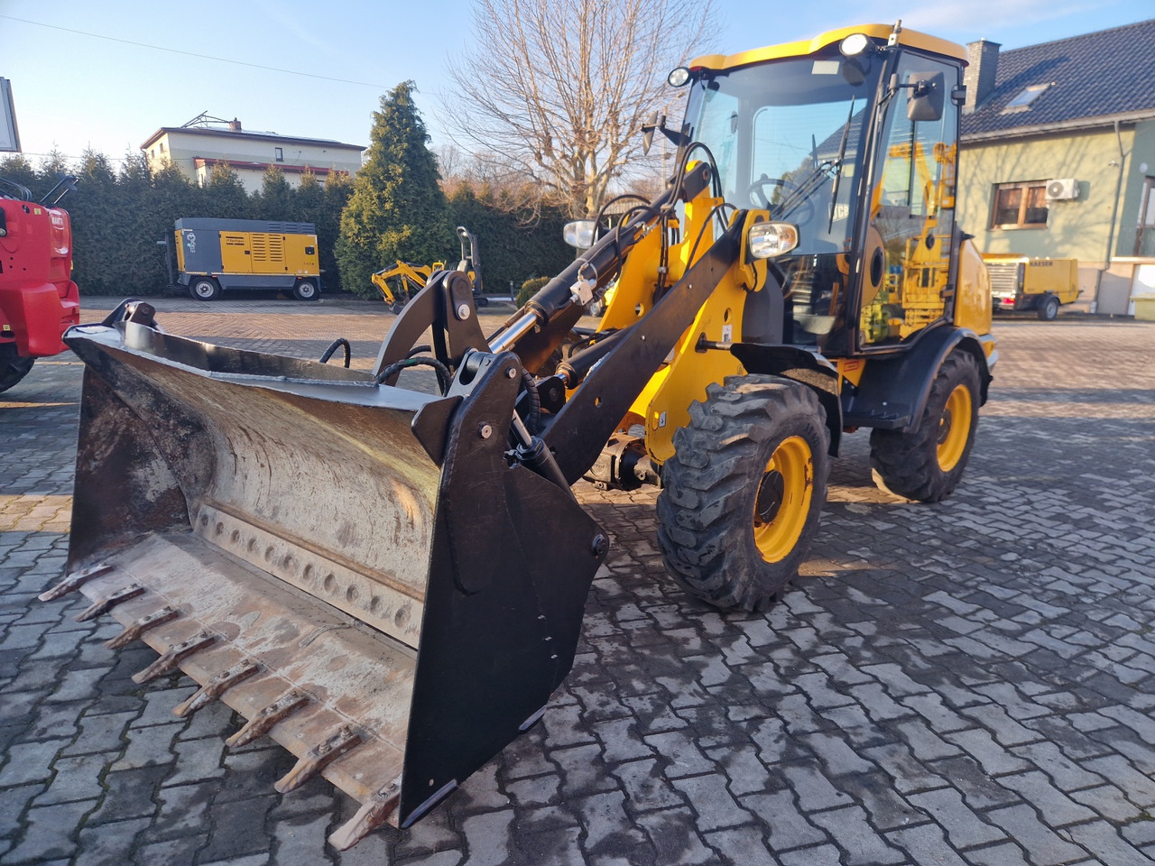Ελαστιχοφόρος φορτωτής JCB 406 B: φωτογραφία 6