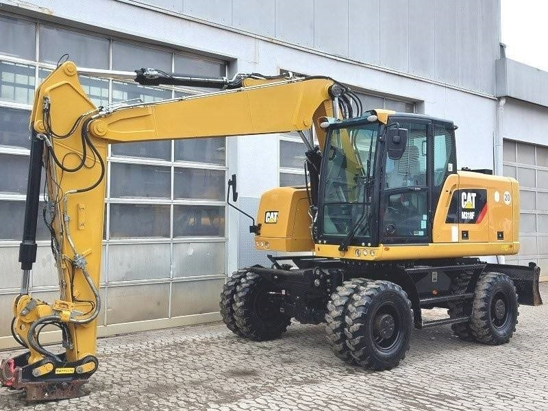 Caterpillar M 318 F - Τροχοφόρος εκσκαφέας: φωτογραφία 2 Caterpillar M 318 F - Τροχοφόρος εκσκαφέας: φωτογραφία 2
