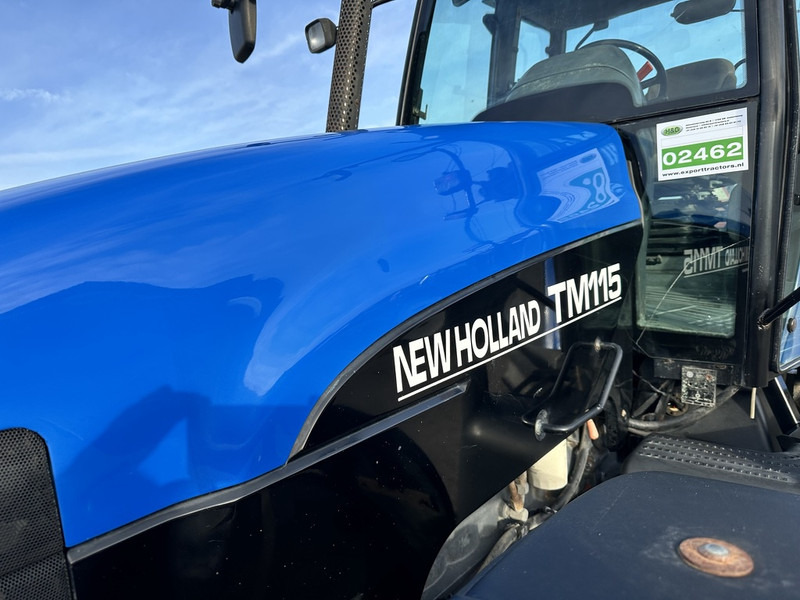 New Holland TM 115 - Τρακτέρ: φωτογραφία 2 New Holland TM 115 - Τρακτέρ: φωτογραφία 2