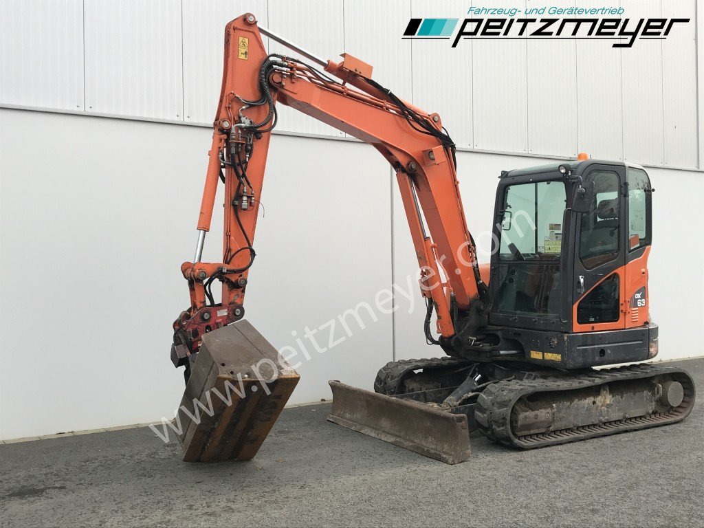 Doosan Kettenbagger DX 63-3 PowerTilt 070 , MS 03, mehrfach vorhanden - Μίνι εκσκαφέας: φωτογραφία 1 Doosan Kettenbagger DX 63-3 PowerTilt 070 , MS 03, mehrfach vorhanden - Μίνι εκσκαφέας: φωτογραφία 1