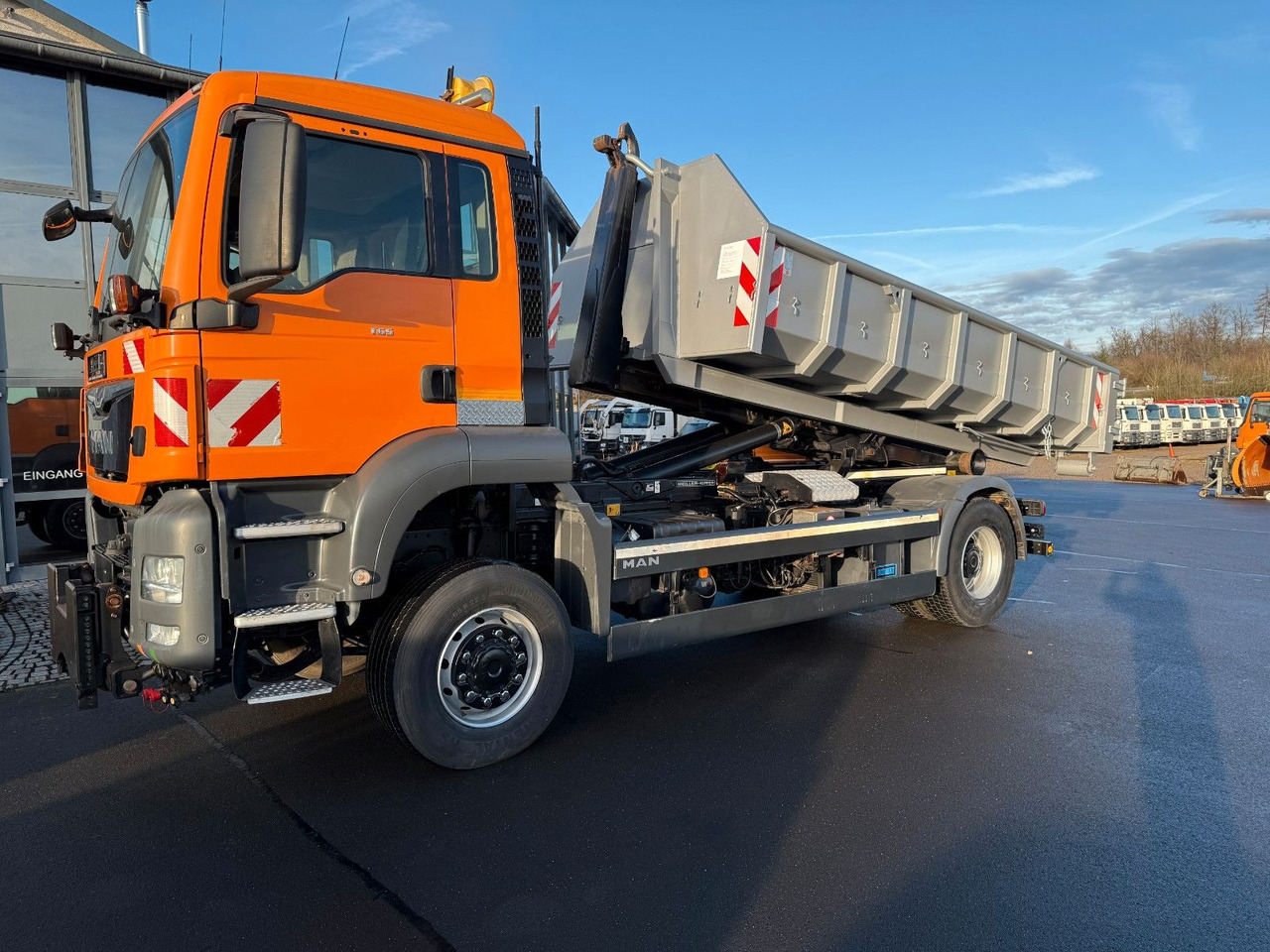 MAN TGS 18.360 4x4 Winterdienst Meiler Abrollkipper - Φορτηγό φόρτωσης γάντζου: φωτογραφία 1 MAN TGS 18.360 4x4 Winterdienst Meiler Abrollkipper - Φορτηγό φόρτωσης γάντζου: φωτογραφία 1