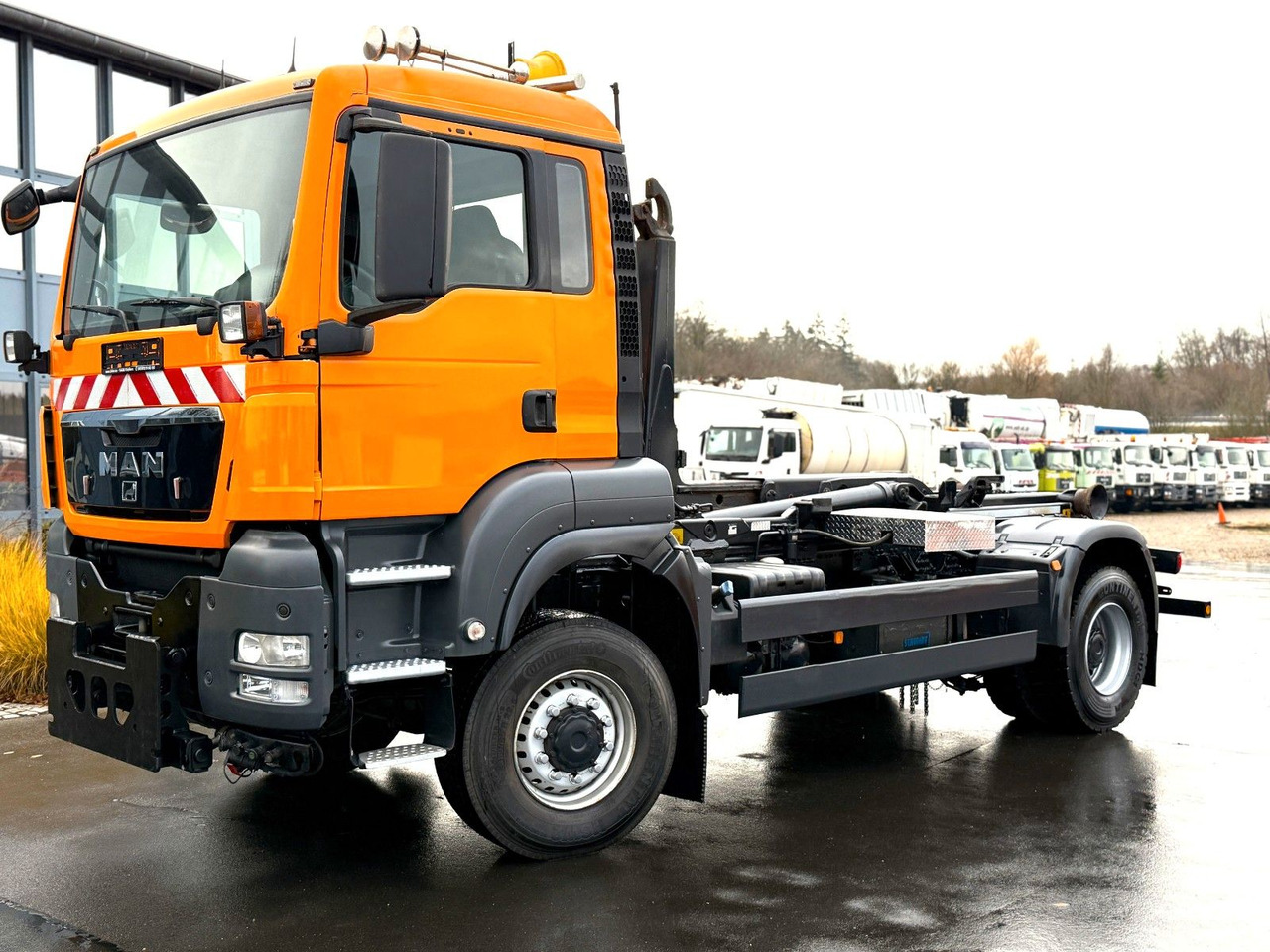 MAN TGS 18.360 4x4 Winterdienst Meiller Abroller - Φορτηγό φόρτωσης γάντζου: φωτογραφία 1 MAN TGS 18.360 4x4 Winterdienst Meiller Abroller - Φορτηγό φόρτωσης γάντζου: φωτογραφία 1