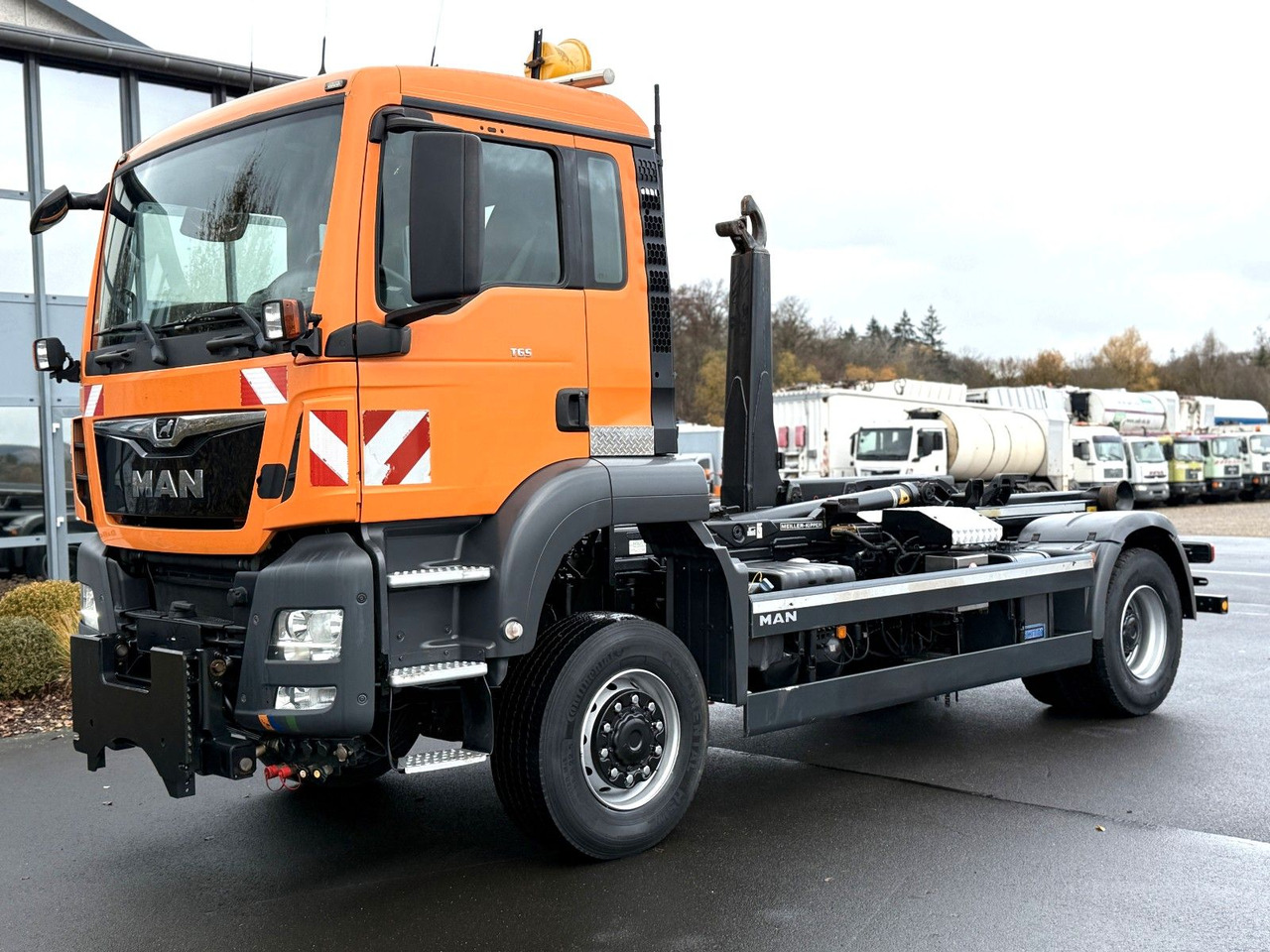 MAN TGS 18.360 4x4 Winterdienst Meiller Abroller - Φορτηγό φόρτωσης γάντζου: φωτογραφία 1 MAN TGS 18.360 4x4 Winterdienst Meiller Abroller - Φορτηγό φόρτωσης γάντζου: φωτογραφία 1
