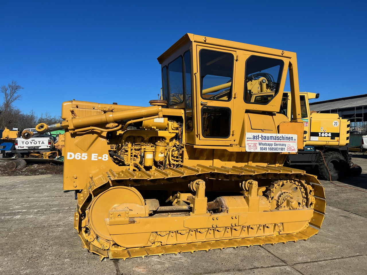 KOMATSU D65-E - Μπουλντόζα: φωτογραφία 1 KOMATSU D65-E - Μπουλντόζα: φωτογραφία 1