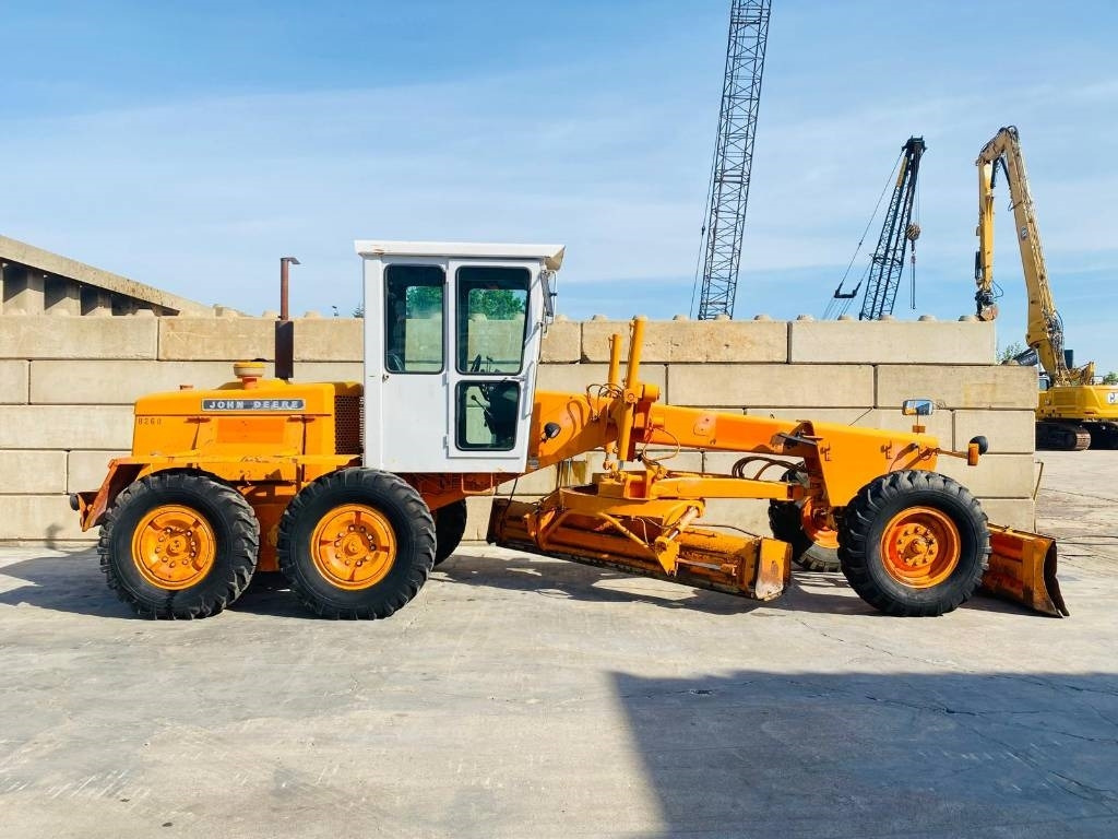 John Deere 570 A - Γκρέιντερ: φωτογραφία 2 John Deere 570 A - Γκρέιντερ: φωτογραφία 2