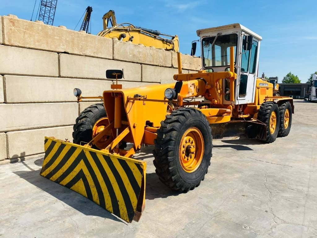 John Deere 570 A - Γκρέιντερ: φωτογραφία 3 John Deere 570 A - Γκρέιντερ: φωτογραφία 3