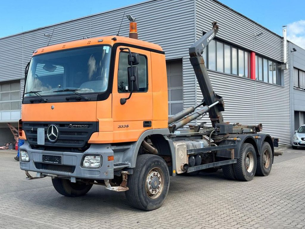 Mercedes-Benz Actros 3336 AK 6x6 Abrollkipper org. nur 84TKM - Φορτηγό φόρτωσης γάντζου: φωτογραφία 1 Mercedes-Benz Actros 3336 AK 6x6 Abrollkipper org. nur 84TKM - Φορτηγό φόρτωσης γάντζου: φωτογραφία 1