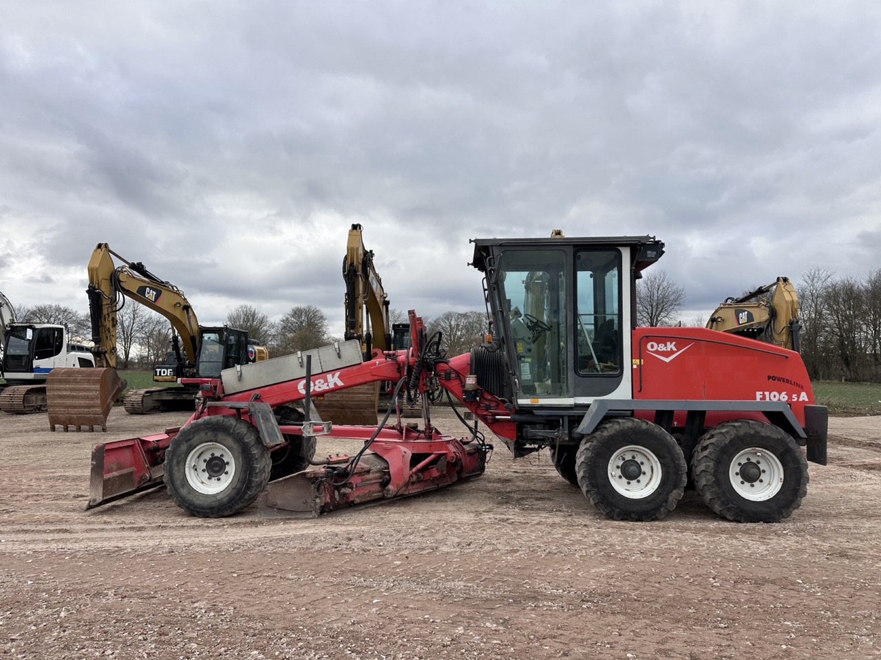 NEW HOLLAND F 106.5 - 6x6 Laser Topcon- Klima Cummins 6 Zyl. - Γκρέιντερ: φωτογραφία 1 NEW HOLLAND F 106.5 - 6x6 Laser Topcon- Klima Cummins 6 Zyl. - Γκρέιντερ: φωτογραφία 1