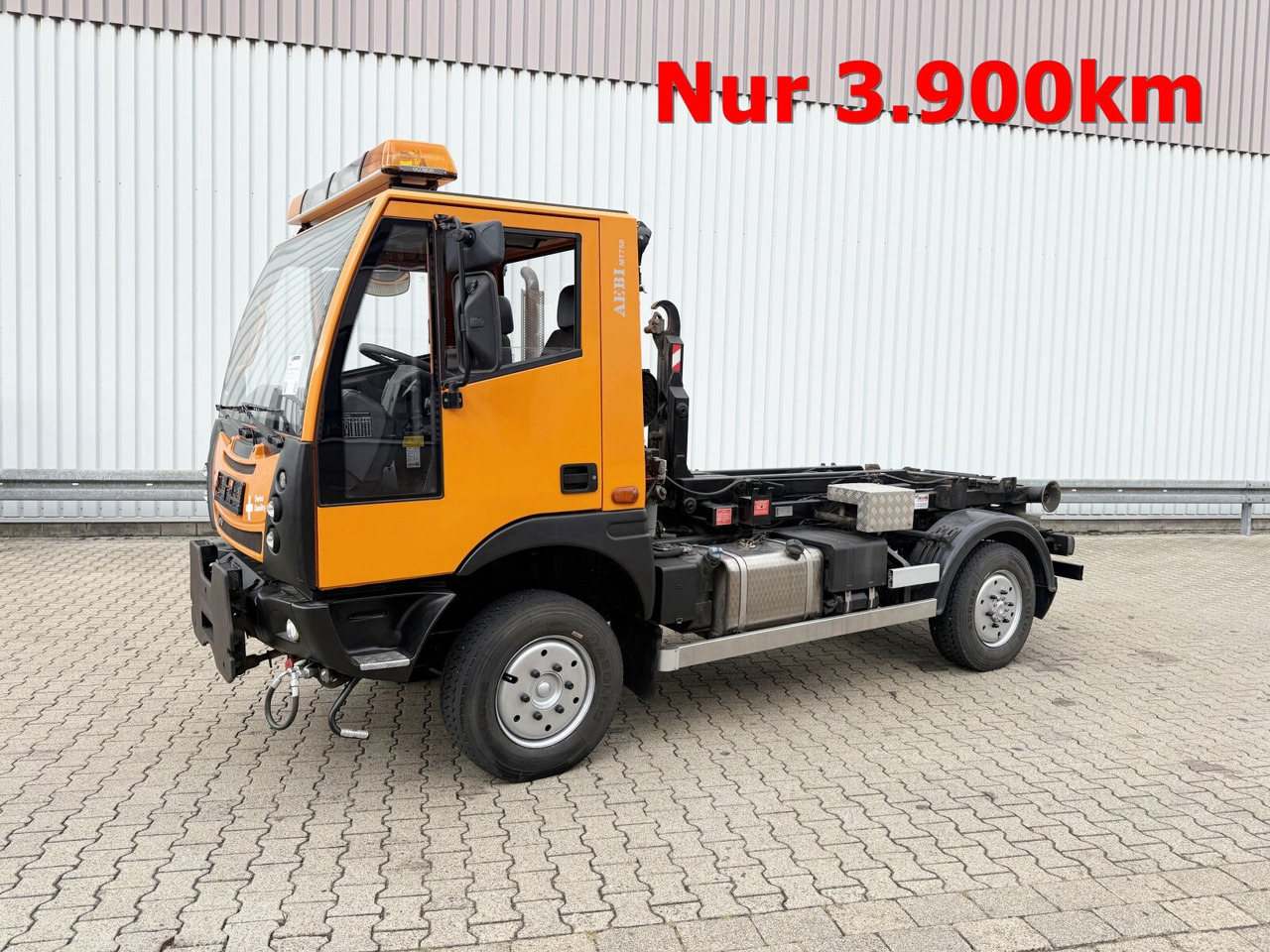 AEBI Schmidt MT750 4x4 AEBI Schmidt MT750 4x4, City-Abroller, Winterdienstausstattung, 2x AHK - Φορτηγό φόρτωσης γάντζου: φωτογραφία 1 AEBI Schmidt MT750 4x4 AEBI Schmidt MT750 4x4, City-Abroller, Winterdienstausstattung, 2x AHK - Φορτηγό φόρτωσης γάντζου: φωτογραφία 1