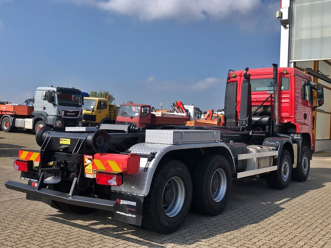 Φορτηγό σασί MAN TGS 41.480 8X8 BB TGS 41.480 8X8 BB, Bender Stahlmulde ca. 18m³, hydr. Heckklappe: φωτογραφία 9