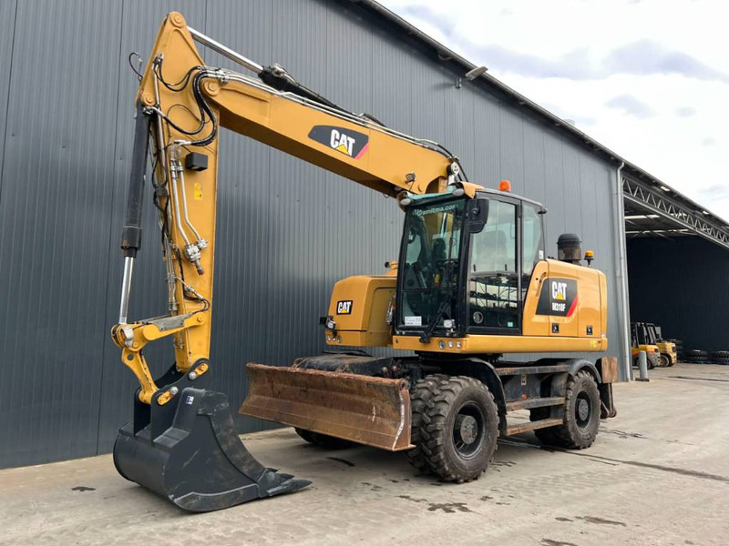 Cat M318F - Τροχοφόρος εκσκαφέας: φωτογραφία 1 Cat M318F - Τροχοφόρος εκσκαφέας: φωτογραφία 1
