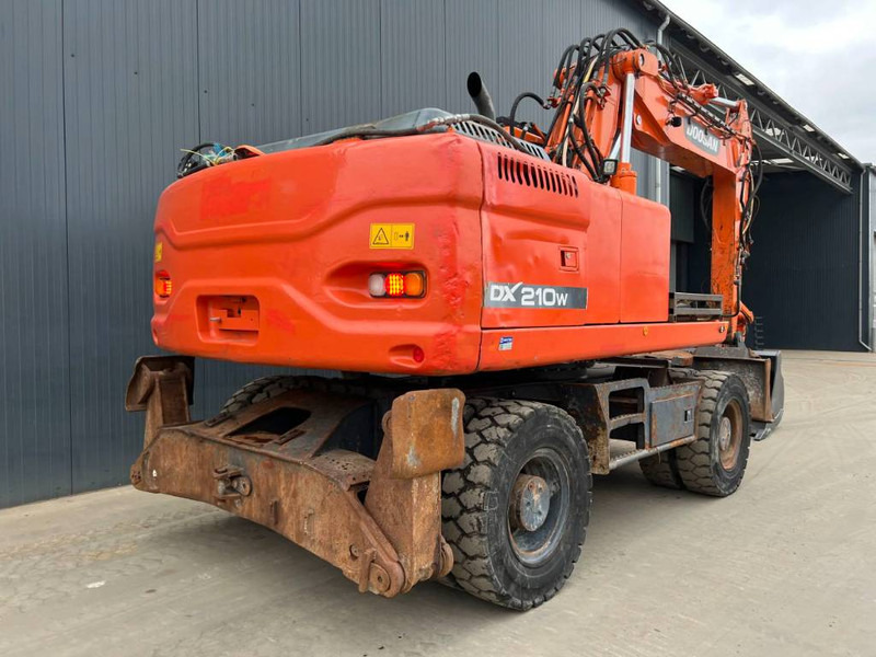 Doosan DX210W - Τροχοφόρος εκσκαφέας: φωτογραφία 4 Doosan DX210W - Τροχοφόρος εκσκαφέας: φωτογραφία 4