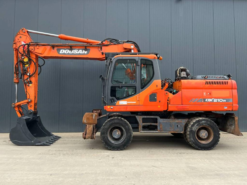 Doosan DX210W - Τροχοφόρος εκσκαφέας: φωτογραφία 5 Doosan DX210W - Τροχοφόρος εκσκαφέας: φωτογραφία 5