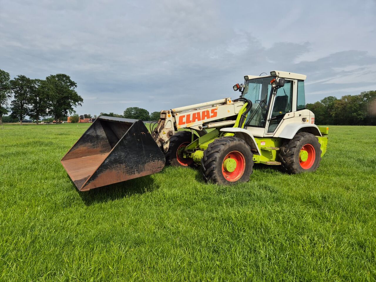 Claas Ranger 940 RX - Ελαστιχοφόρος φορτωτής: φωτογραφία 1 Claas Ranger 940 RX - Ελαστιχοφόρος φορτωτής: φωτογραφία 1