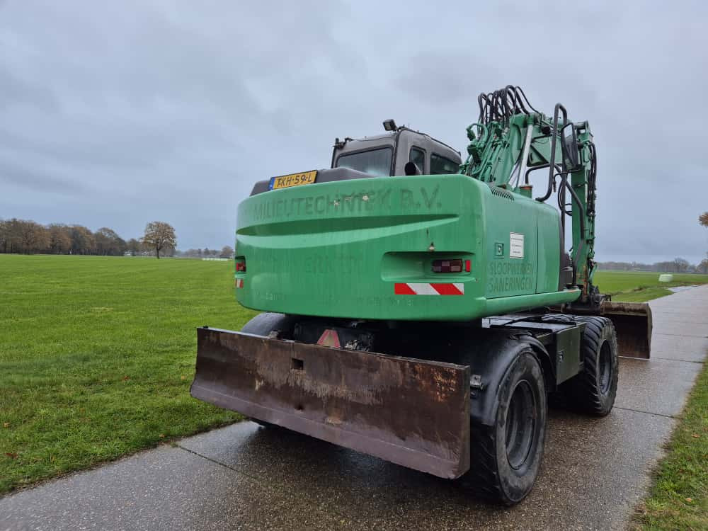 HITACHI ZX 130 W - Τροχοφόρος εκσκαφέας: φωτογραφία 4 HITACHI ZX 130 W - Τροχοφόρος εκσκαφέας: φωτογραφία 4