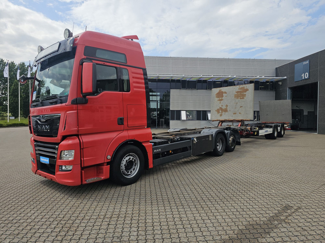 MAN TGX 26.500 with trailer - Φορτηγό μεταφοράς εμπορευματοκιβωτίων/ Κινητό αμάξωμα: φωτογραφία 1 MAN TGX 26.500 with trailer - Φορτηγό μεταφοράς εμπορευματοκιβωτίων/ Κινητό αμάξωμα: φωτογραφία 1