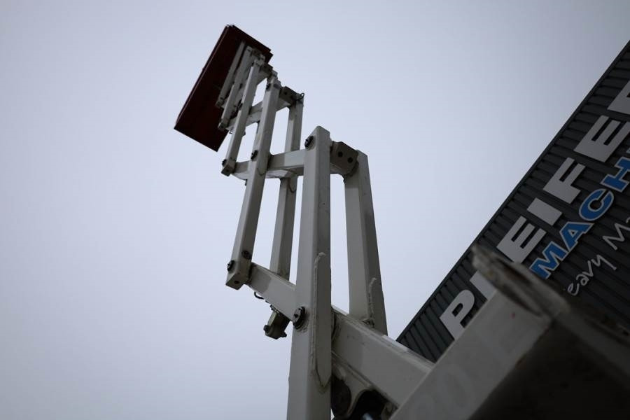 Ψαλιδωτό ανυψωτικό Holland Lift Ecostar HL-9710 Electric, 12m Working Height, 325k: φωτογραφία 9 Ψαλιδωτό ανυψωτικό Holland Lift Ecostar HL-9710 Electric, 12m Working Height, 325k: φωτογραφία 9