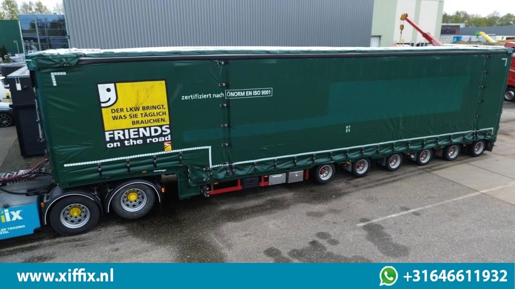 Meusburger 6-ass. Semi dieplader met elektrische huifopbouw / 3x naloop gestuurd - Επικαθήμενο με χαμηλό δάπεδο: φωτογραφία 1 Meusburger 6-ass. Semi dieplader met elektrische huifopbouw / 3x naloop gestuurd - Επικαθήμενο με χαμηλό δάπεδο: φωτογραφία 1