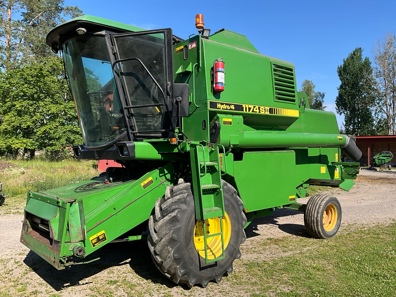 John Deere 1174 S2 Hydro4 - Θεριζοαλωνιστική μηχανή: φωτογραφία 1 John Deere 1174 S2 Hydro4 - Θεριζοαλωνιστική μηχανή: φωτογραφία 1