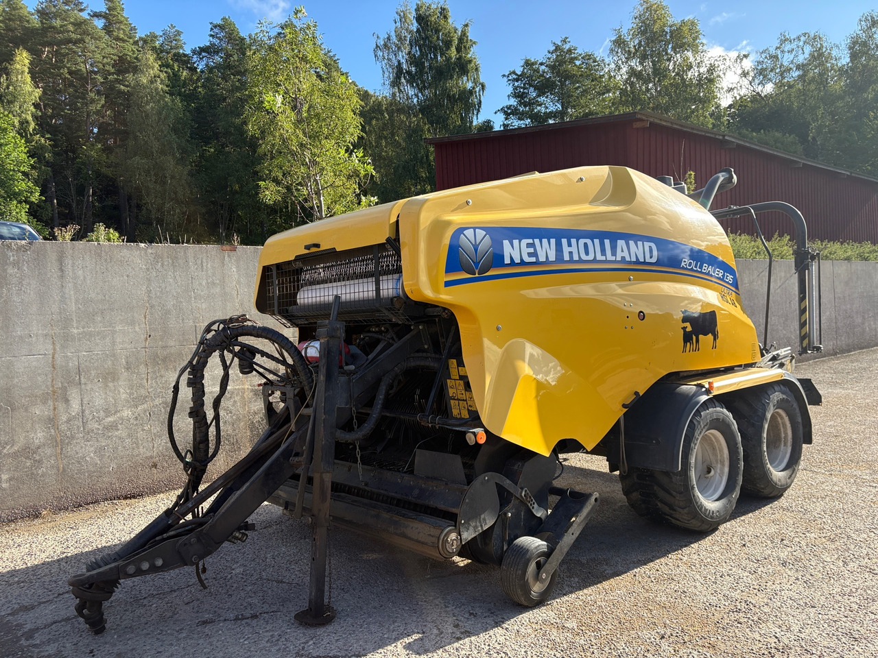 New Holland Roll Baler 135 - Χορτοδετική μηχανή στρόγγυλης μπάλας: φωτογραφία 1 New Holland Roll Baler 135 - Χορτοδετική μηχανή στρόγγυλης μπάλας: φωτογραφία 1