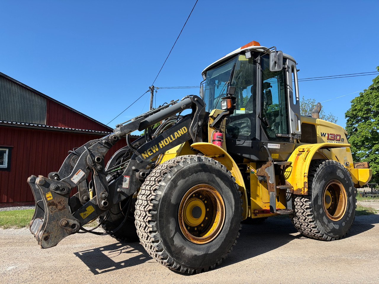 New Holland W130B - Ελαστιχοφόρος φορτωτής: φωτογραφία 1 New Holland W130B - Ελαστιχοφόρος φορτωτής: φωτογραφία 1