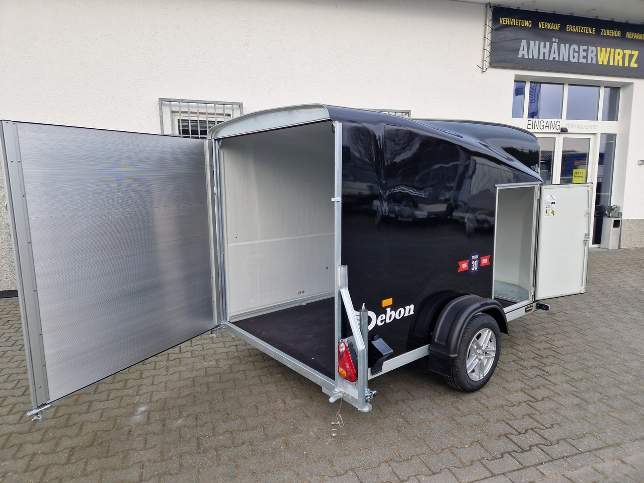 Ρυμούλκα κόφα Debon Cargo 1300 300x152x168cm black Seitentür Alufelgen darkl Pullman II 100km/H 1300kg Modell 25: φωτογραφία 17