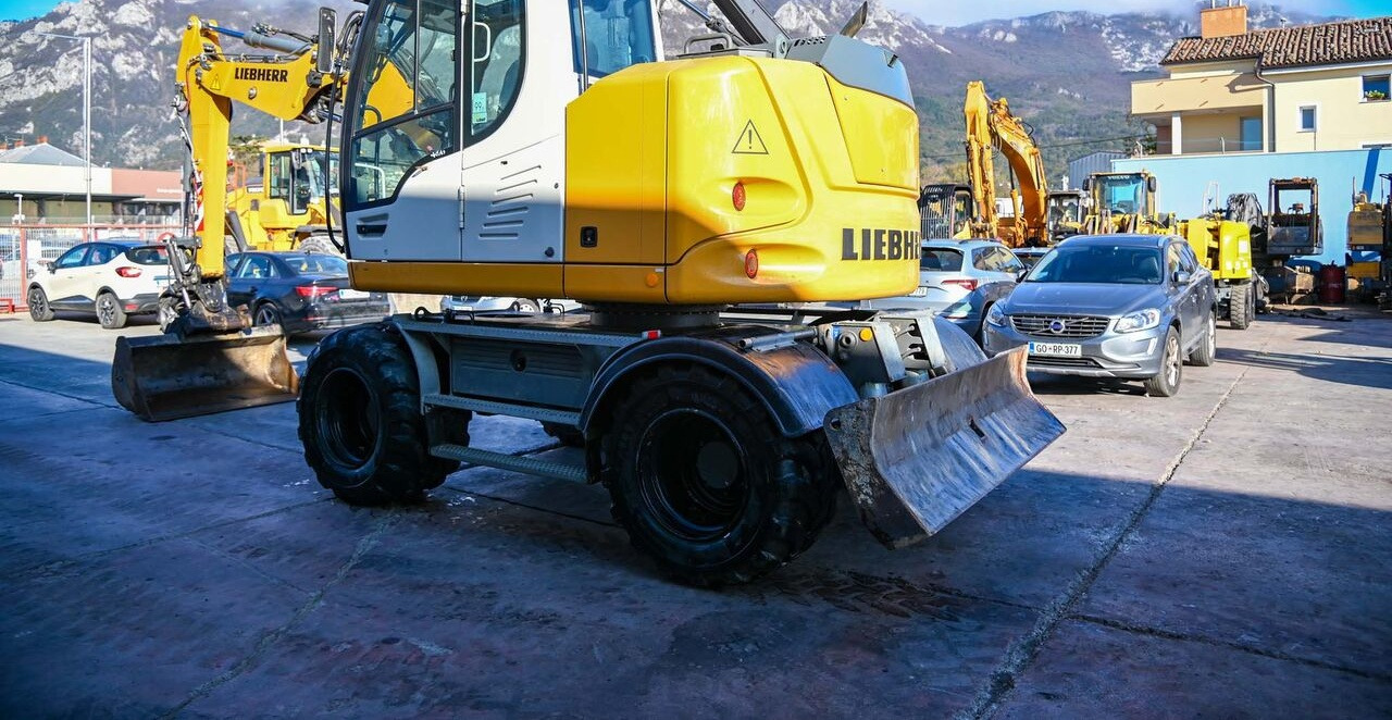 Liebherr A910 - Τροχοφόρος εκσκαφέας: φωτογραφία 4 Liebherr A910 - Τροχοφόρος εκσκαφέας: φωτογραφία 4