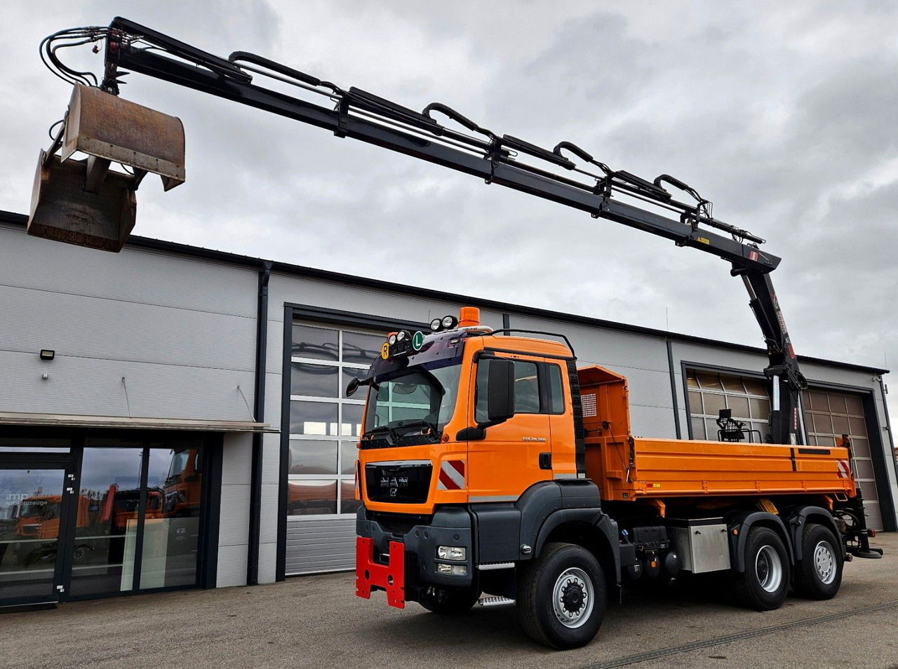 MAN TGS 28.360 6x4-4 HIAB 144E-4 Kran Euro5 - Φορτηγό ανατρεπόμενο, Φορτηγό με γερανό: φωτογραφία 1 MAN TGS 28.360 6x4-4 HIAB 144E-4 Kran Euro5 - Φορτηγό ανατρεπόμενο, Φορτηγό με γερανό: φωτογραφία 1