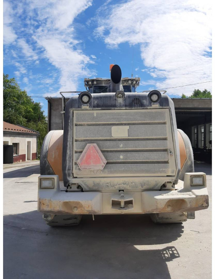 Ελαστιχοφόρος φορτωτής CAT 980: φωτογραφία 15