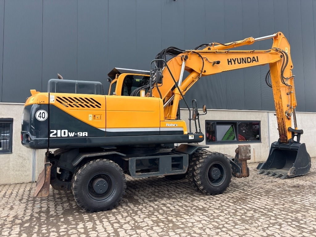 Hyundai Robex 210 W-9 A - 210 W - 200 W - 180 W - Τροχοφόρος εκσκαφέας: φωτογραφία 5 Hyundai Robex 210 W-9 A - 210 W - 200 W - 180 W - Τροχοφόρος εκσκαφέας: φωτογραφία 5