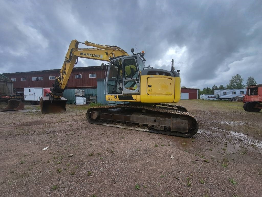 New Holland Kobelco E 235 B SR-2 - Ερπυστριοφόρος εκσκαφέας: φωτογραφία 3 New Holland Kobelco E 235 B SR-2 - Ερπυστριοφόρος εκσκαφέας: φωτογραφία 3