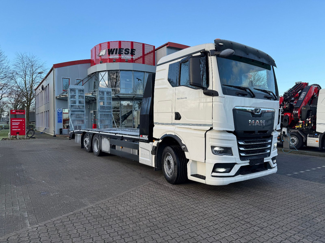 MAN Baumaschinen- Arbeitsbühnentransporter Rampen - Φορτηγό ρυμούλκησης: φωτογραφία 1 MAN Baumaschinen- Arbeitsbühnentransporter Rampen - Φορτηγό ρυμούλκησης: φωτογραφία 1