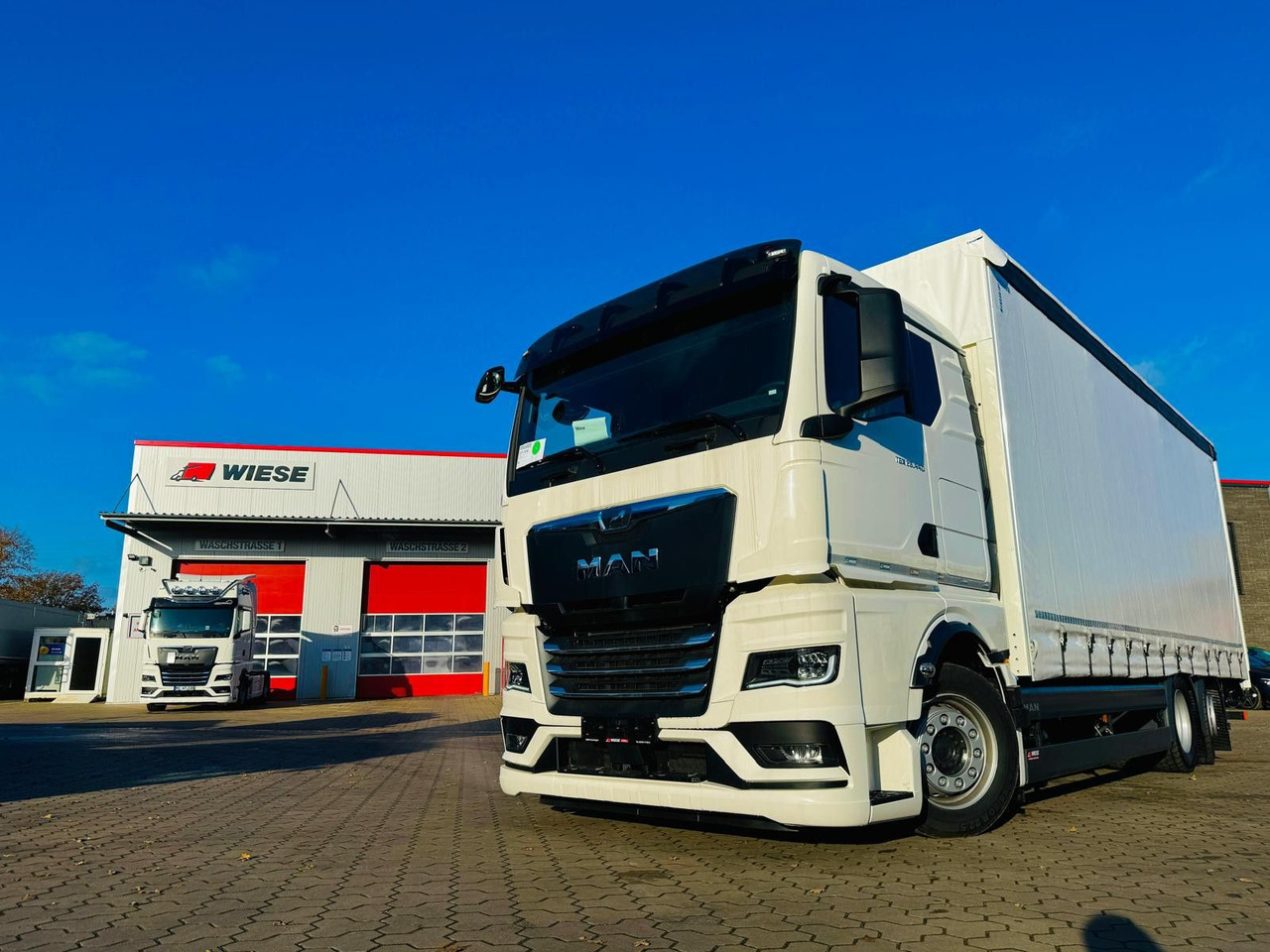 MAN TGX 26.440 6x2 LL Schwerlast Ladebordwand/Rampe - Φορτηγό μουσαμάς: φωτογραφία 1 MAN TGX 26.440 6x2 LL Schwerlast Ladebordwand/Rampe - Φορτηγό μουσαμάς: φωτογραφία 1